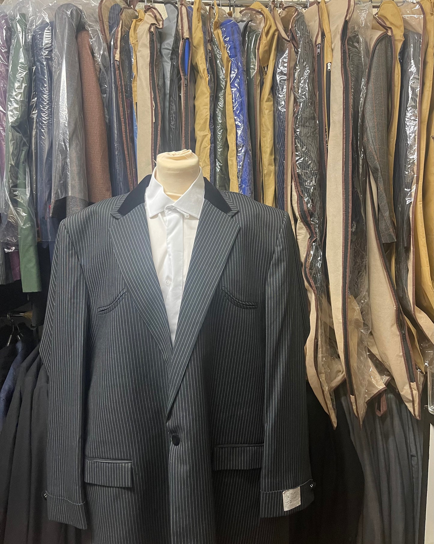Black pinstripe fabric chest 50 , waist size 38. 3 piece suit ( different trousers can be arranged )